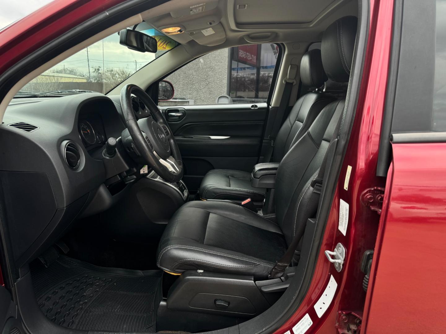 2014 RED /Black JEEP COMPASS LATITUDE Latitude 4dr SUV (1C4NJCEA3ED) with an 2.0L I4 engine, CVT transmission, located at 5900 E. Lancaster Ave., Fort Worth, TX, 76112, (817) 457-5456, 0.000000, 0.000000 - This is a 2014 JEEP COMPASS Latitude 4 DR SUV that is in excellent condition. The interior is clean with no rips or tears or stains. All power windows, door locks and seats. Ice cold AC for those hot Texas summer days. It is equipped with an AM/FM radio, AUX port, Bluetooth connectivity and Sirius X - Photo#8